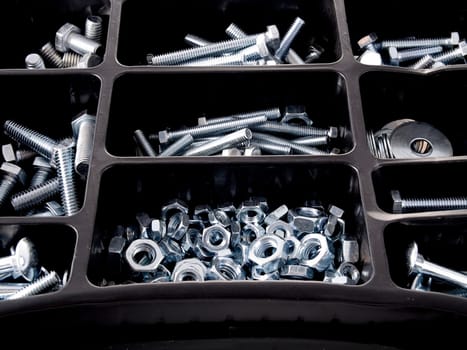 screws and nuts on a white background