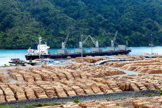 Timber is ready for shipping at a dock in New Zealand