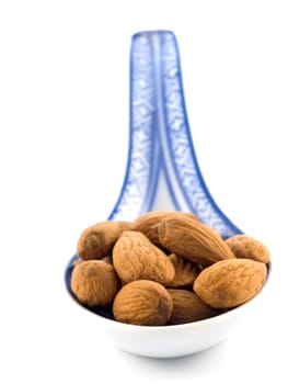 group of almonds isolated on white background