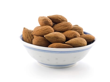 group of almonds isolated on white background