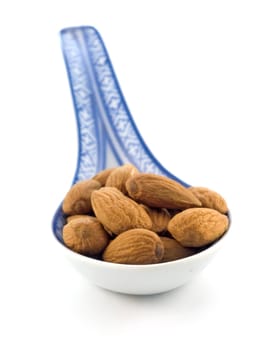 group of almonds isolated on white background