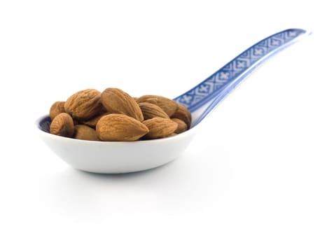 group of almonds isolated on white background