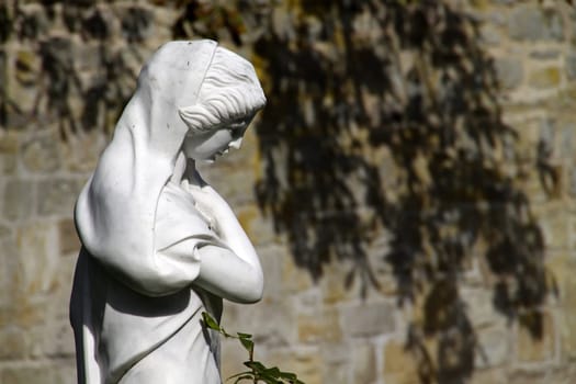 White statue on a grave