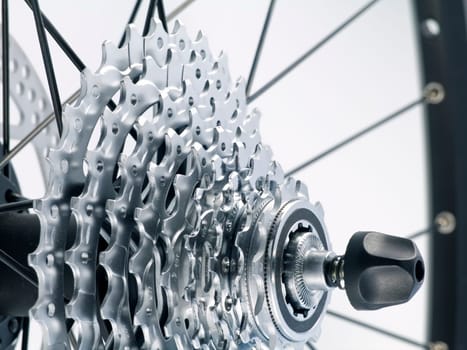 series sport:  rear bicycle cog cassette isolated on white background (close-up)