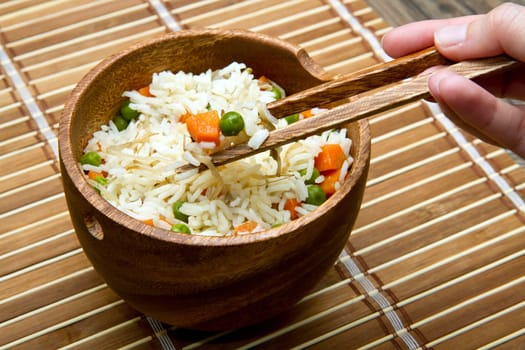 Chinese fried rice with carrots, peas and soybeans