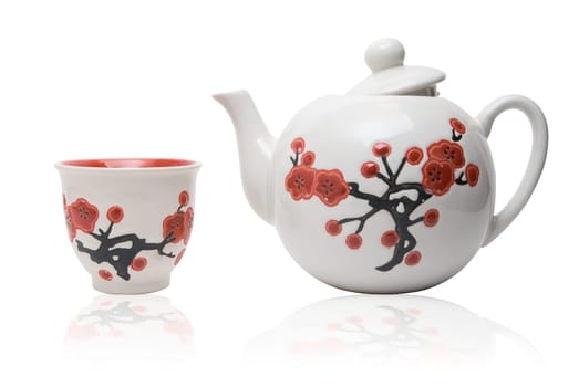 Tea-things in asian style with flowers. Isolated on white.