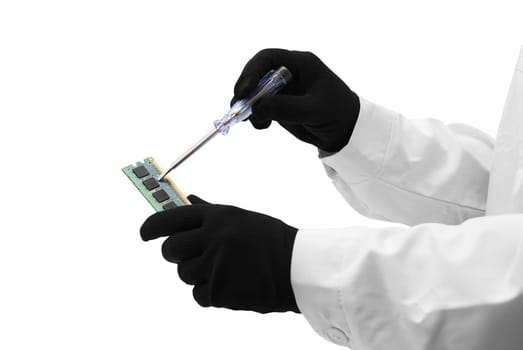 Repairing microchip. Hands with gloves repair chip on white