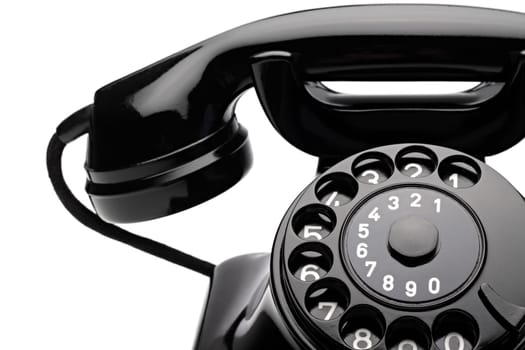 An old telephone with a dial.