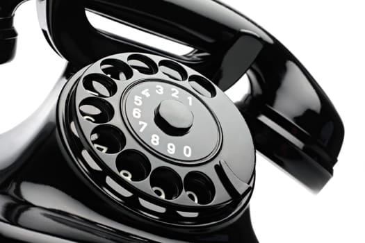 An old telephone with a dial.