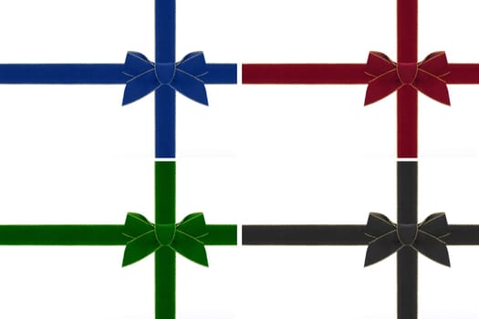 A bow made of blue,red,green and black velvet with matching ribbon.