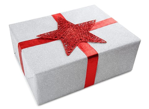 Gift in rope glitter paper with red ribbon and star.