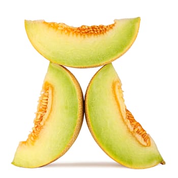 A stack of galia honeydew melon slices on a white background.