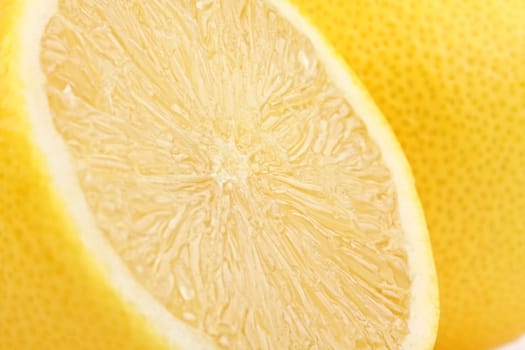 A freshly sliced lemon in profile.
