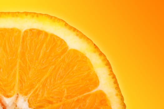 Orange slice against orange yellow background