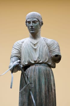 image of the famous sculpture the bronze charioteer in Greece