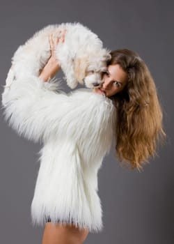 sexy attractive woman posing glamorous with her pet