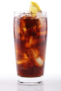 Ice-cold cola with ice and lemon.