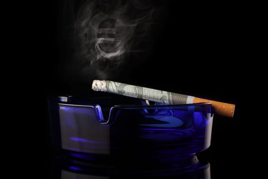 Burning cigarette from a euro bill.