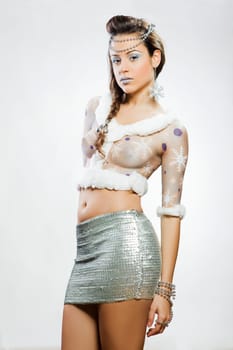young attractive girl with a winter or christmas body painting
