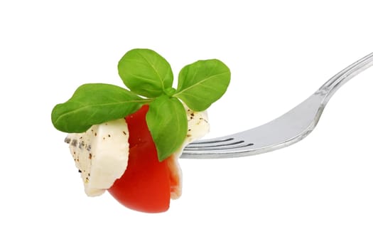 Italian cheese basalikum and tomtate on fork