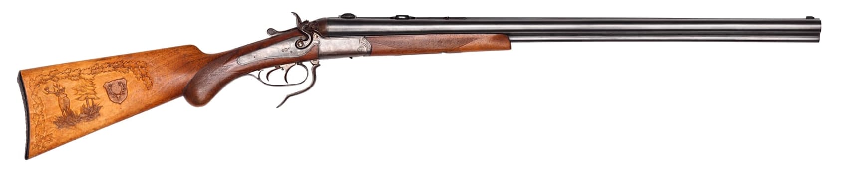 Old hunting rifle with carving isolated.