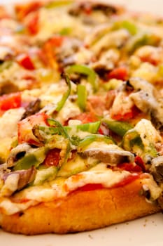 Close-up of a delicious pizza in a greek outdoor restaurant
