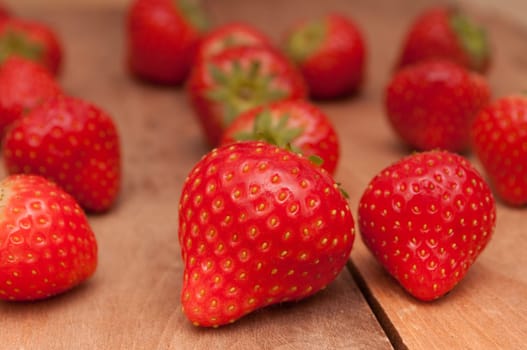 Fresh Red Strawberries on Old Wooden Table