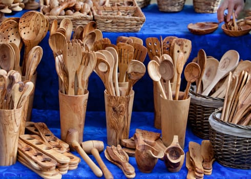 assortment of wooden spoons .