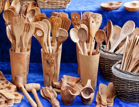 assortment of wooden spoons .