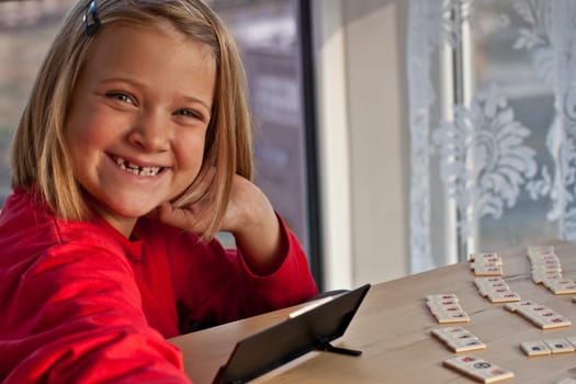 Girl plays rummikub