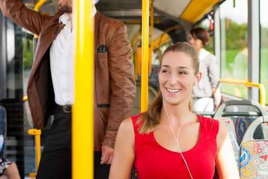 Female passenger on a bus