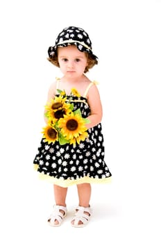 Baby Girl Smelling Flowers