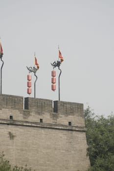 Xian Old Town,view of the city wall - lanterns and flag