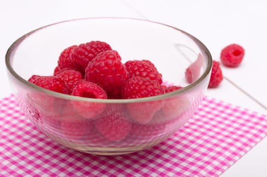 Fresh Raspberries in Bowl on White Table