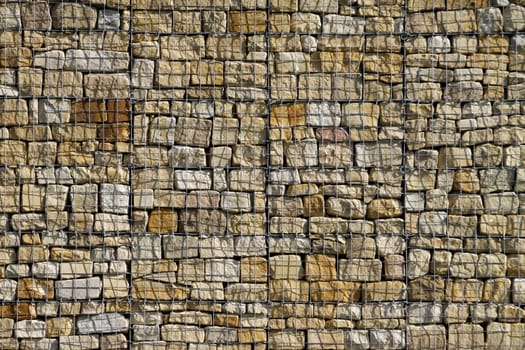 Wall in gabion construction