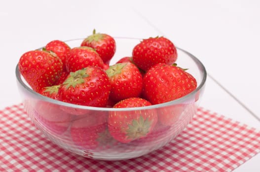 Fresh Strawberries in Glass Bowl on Wooden Table