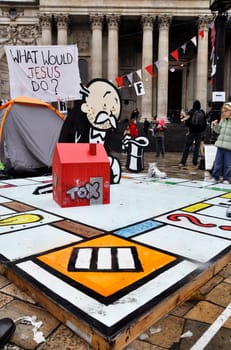 LONDON - OCTOBER 27: Occupy London encampment at St Paul&#039 s Cathedral on October 27, 2011 in London. Occupy London is a peaceful demonstration against economic inequality and social injustice.