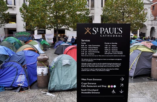 LONDON - OCTOBER 27: Occupy London encampment at St Paul&#039 s Cathedral on October 27, 2011 in London. Occupy London is a peaceful demonstration against economic inequality and social injustice.