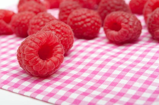 Fresh Raspberries on Pink Gingham Tablecloth