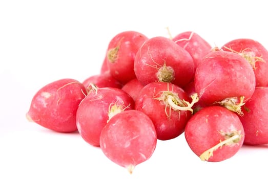 Red radishes isolated on white background