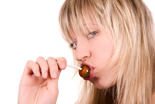 Lovely young women sucking lollipop on white