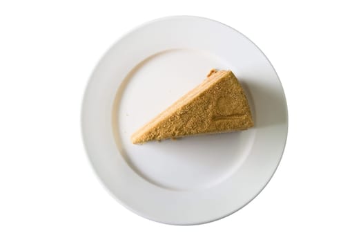Piece of a pie at plate on white. Top View
