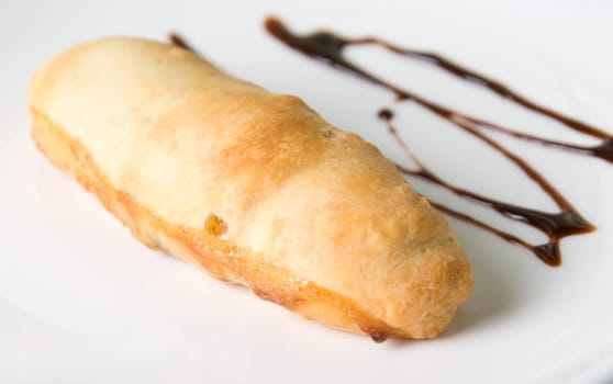 Close up of sweet bun with chocolate