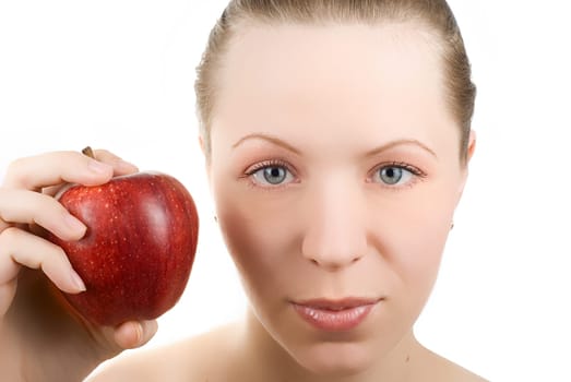 Portrait of young woman with apple, isolated on white