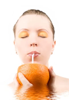 Pretty girl drink orange juice on white