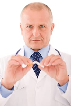 Stop smoking mature doctor male breaks cigarette focus on hand