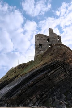 ballybunion castle on the rocks in the west coast of ireland
