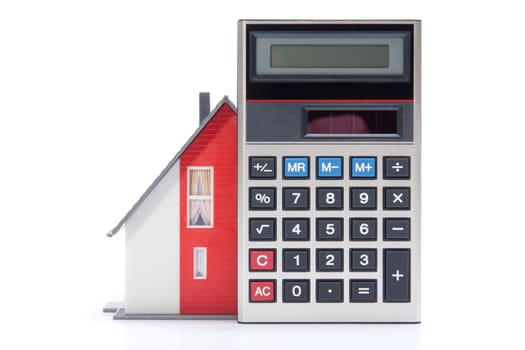 Home financing (cost of occupancy) concept - model of the house and calculator