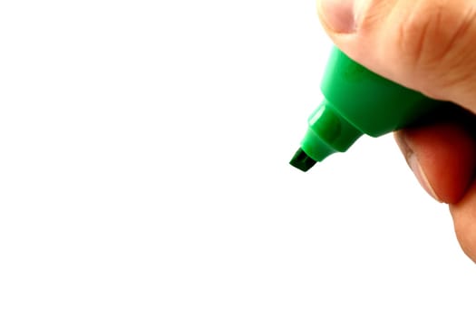 Hand with green pencil