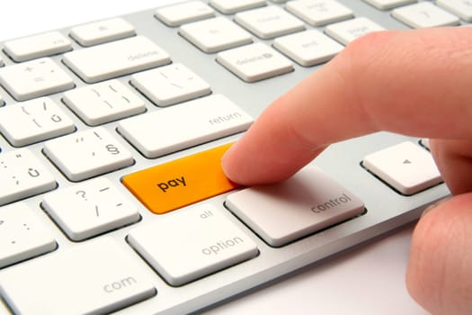 Keyboard with golden button pay - electronic payment and e-banking concept